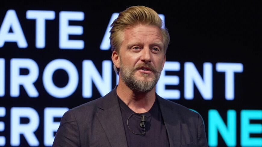 A speaker emphasizes the importance of fostering an environment where everyone feels included and valued, with a focus on engagement and belonging.